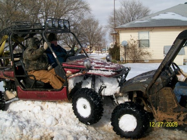 Snow Storm of 2009   Justin giving a push.JPG